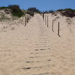 Track down dunes onto Wallagoot Beach