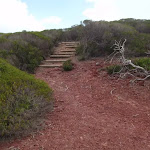 Stairs onto red cliffs
