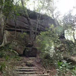 Steps and track passing cliff