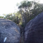 Climbing up through the large rock outcrop
