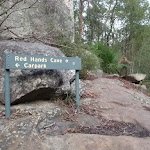 Sign to Red Hands Cave
