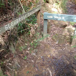 Signs across small stream