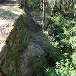 A retaining wall supporting Shepherd's Gully road