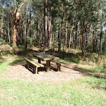 Picnic table next to tower