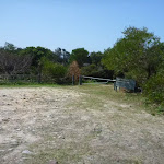 Locked management gate near coastal cemetery