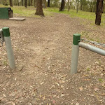 Green metal track markers near Mt Sugarloaf