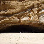 Large dark cave on Caves Beach