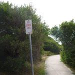 Dog walking area sign on the Owens Walkway in Redhead