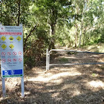 Locked gate and Blackbutt Reserve sign near Lookout Road