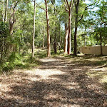 Trail with house visible in Blackbutt Reserve