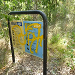 Graffiti on sign in Green Point Reserve 