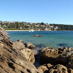Kayaker passing the coast track