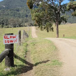 a slow down warning sign for cars