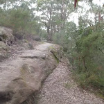 Track up rocky outcrop